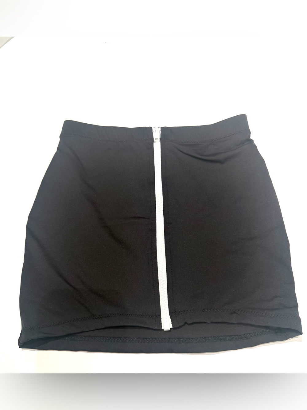 SKIMS Black Mini Skirt with White Front Zipper